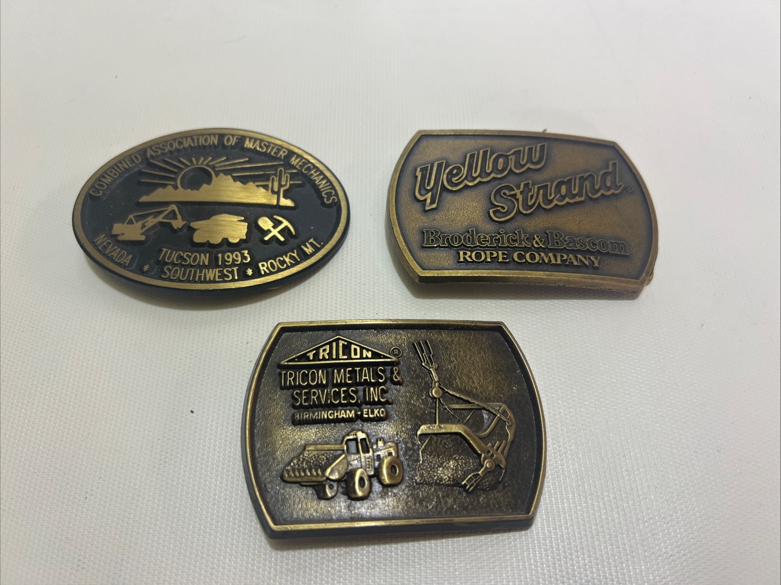 Lot Of 3 BRASS BELT BUCKLES ADVERTISING EVENT TRICON YELLOW STRAND MECHANICS